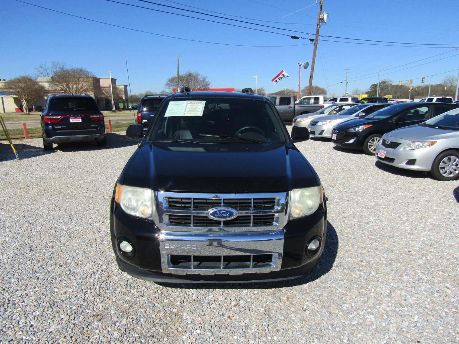 2010 Black Ford Escape Limited FWD (1FMCU0EG8AK) with an 3.0L V6 DOHC 24V engine, Automatic transmission, located at 15016 S Hwy 231, Midland City, AL, 36350, (334) 983-3001, 31.306210, -85.495277 - Photo #1